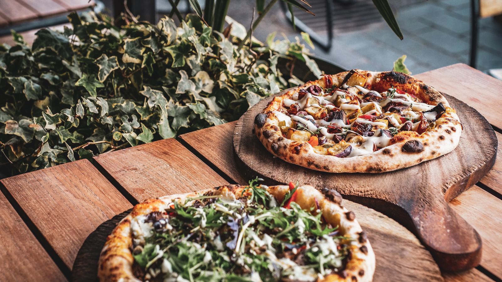 BASE pizzas on a table